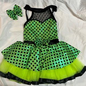 Green and black dance costume